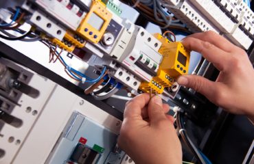 An electrician working on an electrical installation